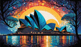 A Diamond Painting Rendering Of Sydney Opera House Against A Vibrant Sunset Sky With Hues Of Orange, Blue, And Purple, Reflecting On The Water Below. Size - 120cm X 70cm