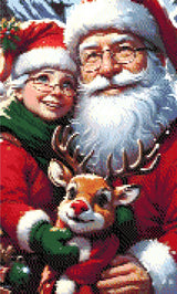 A Diamond Painting Rendering Of Santa And Mrs. Claus Smiling With Rudolph The Red-nosed Reindeer, Set Against A Snowy Village Backdrop. Size - 30cm X 50cm