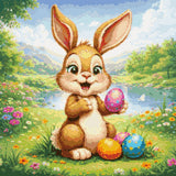 Cheerful bunny holding a colourful Easter egg in a meadow. Size - 40cm x 40cm