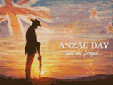 Silhouetted soldier at sunrise with ANZAC Day text and Union Jack flag. Size - 40cm x 30cm