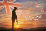 Silhouetted soldier at sunrise with ANZAC Day text and Union Jack flag. Size - 90cm x 60cm