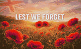 Field of red poppies with 'LEST WE FORGET' text under a sunrise sky. Size - 50cm x 30cm