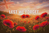 Field of red poppies with 'LEST WE FORGET' text under a sunrise sky. Size - 60cm x 40cm