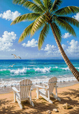 Two chairs on a sandy beach under a palm tree, facing the sea. Size - 70cm x 100cm