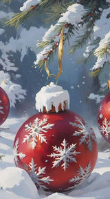 Red Christmas ornament with snowflake design hangs from snow-covered pine branch in a snowy winter setting.